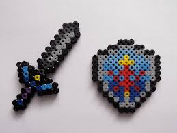 Master Sword And Hylian Shield Legend Of Zelda Perler Bead Sprite Magnets 5 00 Via Etsy Perler Bead Art Perler Bead Patterns Perler Beads