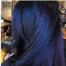 A Dark Black Hue With A Hint Of Blue And Violet Is Not Only Mysterious But Very Flattering It S A Great Way To Blue Hair Dark Dark Blue Hair Blue