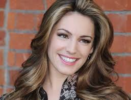 Kelly Brook supports beau David McIntosh 'like Posh'