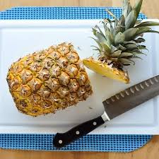 Slice the skin off of the pineapple in a downward motion. How To Cut Up A Whole Pineapple Kitchn