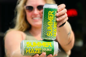 You asked, we answered. Summer Haze, double hazy IPA, is BACK!!! Summer  Haze pours with a light malt base and thick, dense white head which will  lace down the glass. Aromas of