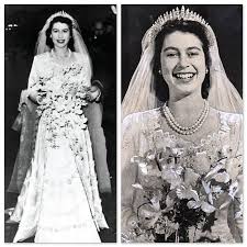 Hartnell cited botticelli 's famous painting primavera, which symbolises the coming of spring, as his inspiration for the design. August 2012 Queen Elizabeth Wedding Royal Wedding Dress Dresses Queen Elizabeth