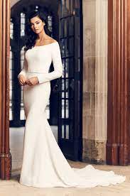 Lace long sleeves, embroidered bodice do this long sleeve gowns are breathtaking, elegant and totally modern. Simple Fit And Flare Long Sleeve Wedding Dress With Beaded Belt Kleinfeld Bridal