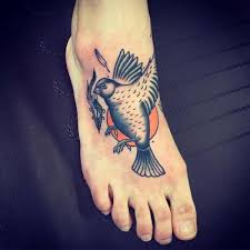 The procedure of tattooing is quite painful on this body amusing tattoo. Foot Bird Tattoo By Solid Heart Tattoo