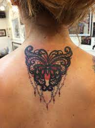 Black Lace Butterfly Tattoo With Embellishments My Ink Done By Teri At Tattoo Nouveau In Green Bay W Lace Butterfly Tattoo Lace Tattoo Butterfly Tattoo