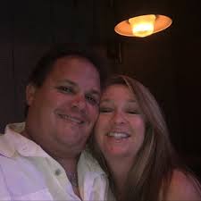 Who can make a custom motorcycle cake with chocolate, strawberry, and white  layers in Henderson?