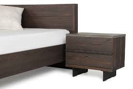 A modern wood nightstand won't be the star of the show, but it's a very important part of the supporting cast. Modrest Selma Modern Dark Aged Oak Concrete Nightstand Nightstands Bedroom