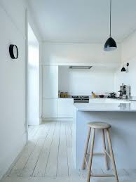 They end up asking us if they can combine the brightness of light cabinets with dark kitchen floors. White Wood Floors And Other White Flooring Options Ideas 2021 Home Flooring Pros