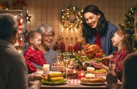 Skip the turkey this year and branch out into other fantastic roasts. Family Celebrating Christmas Merry Christmas Happy Family Are Having Dinner At Aff Merry Family Christmas Dinner Christmas Dinner Table Christmas Dinner