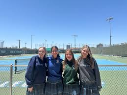 Xavier tennis secures team and doubles championship