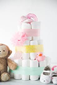 Secure the tiers with dowels. How To Make A Diaper Cake In 3 Super Simple Steps Play Party Plan