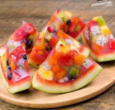 Slices Of Jello Fruit Filled Watermelon Watermelon Jello Fruit Recipes Jelly Desserts