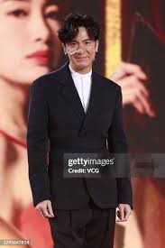 Bowie Cheung, Miss Friendship 2016, wearing a face shield, attends... News  Photo