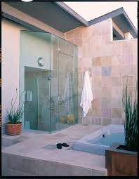 The cost of installing an outdoor shower is really no higher than that of installing one photo about bathroom outside in the nature. Indoor Outdoor Bathing Contemporary Bathroom Los Angeles By Leslie Harris Interior Design