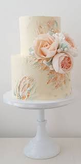 This floral face cake gives new meaning to 'flowers in your hair'! The Prettiest Buttercream Floral Art Wedding Cakes With A Modern Spin