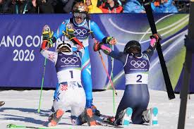 Federica Brignone was taking in the magnitude of winning a second gold of  her home Winter Olympics when the two silver-medalists approached the Italian  skiing star in the finish area, dropped to