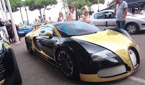 The extremely rare convertible veyron grand sport, with only 150 ever made, originally started off with a white paint scheme but was sent to dubai for a makeover. Video Gold And Black Bugatti Veyron In Cannes Gtspirit