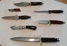 Texas parks and wildlife hunter. Custom Knives Wild Hog Gut Hook