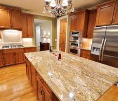 Oak Cabinets With Granite Countertops We Have Full Time Installer To Accurately Complete The Kitchen Remodel Countertops Granite Kitchen Oak Kitchen Cabinets