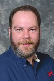 Wooley sentenced to at least 34 months in prison and ordered to pay back  embezzled $317,129