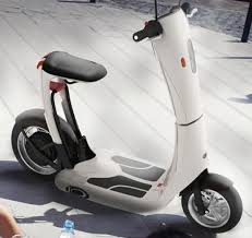 Buying a motorcycle or a scooter is a big decision. Foldable Scooter Lets Treehuggers Move Around In Style Scooter Scooter Design Best Electric Scooter