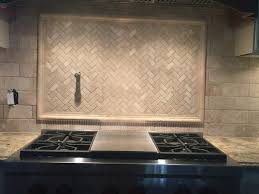Was thinking of doing the mosaics just over the stove in a column (without a border). Help Backsplash Is Not Centered To Cooktop