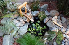 A pretty water feature livens up a small slice of yard. Diy Fountain Ideas 10 Creative Projects Bob Vila