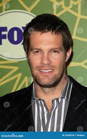 Geoff Stults editorial photography. Image of party, green