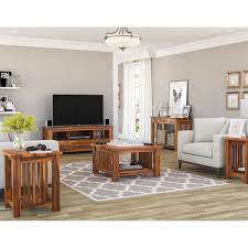 Your rustic living room is the place where no one is afraid to put their feet on the coffee table or set their drink down without a coaster. Jeddito Mission Rustic Solid Wood 5 Piece Living Room Set