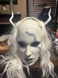 ISO this Mardi Gras mask. This mask is really special to us and it was  misplaced at the Joe Cain parade. We were standing at the Holiday Inn  downtown- we asked the