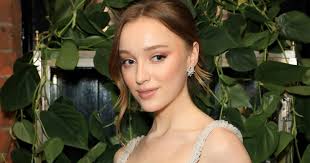 Phoebe Dynevor Debuts Shag Curtain Bangs & Copper Hair