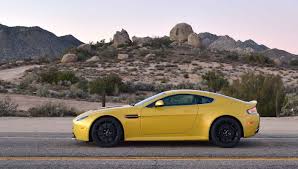Image result for New Yellow 2016 Aston Martin
