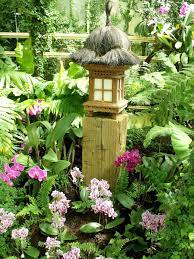 Lantern And Orchids Balinese Garden Garden Projects Outdoor Deco