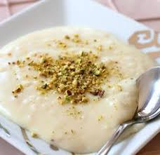 Lebanese Rice Pudding Dessert With Pistachio Riz B Haleeb Recipe Rice Pudding Lebanese Desserts Lebanese Recipes