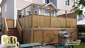We, meaning my husband, first screwed through the bottom of the frame into the deck railing. Deck With Lattice Privacy Screen And Reinforced Lattice Bottom