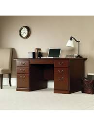 This executive office desk has three file drawers with full extension slides hold letter, legal or european size hanging files. Office Depot