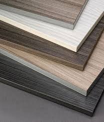 Textured Melamine Doors For A Sleek Kitchen Melamine Cabinets Plywood Kitchen White Wood Texture