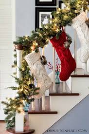 Christmas Entry Decor Garland Stockings Berries On Sutton Place Christmas Staircase Decor Christmas Decor Diy Christmas Staircase