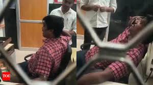 Watch: Viral video of Karnataka railway clerk on phone ignoring passengers  sparks outrage; staff dismissed after backlash | India News - Times of India