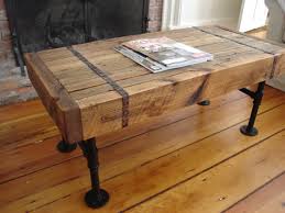 The coffee tables are handmade of rough mango wood which is solid, stable, durable and beautiful, and the craftsmanship adds to their spectacular retro style. Rustic Industrial Reclaimed Wood Pipe Coffee Table Rustic Living Room Montreal By Wood Iron Lamps Houzz
