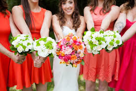 Dreamstime is the world`s largest stock photography community. Orange And Pink Bridal Bouquet And Ivory And Green Bridesmaid Bouquets