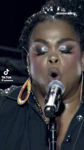 Black Woman Singing in Arena Star Spangled Banner