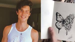 Shawn mendes is growing up! Shawn Mendes Debuts Huge New Tattoo Tattoo Ideas Artists And Models