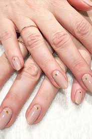 Top it off with an intricate gold brush twirl with the tiniest bead over a clean white polished base on the ring finger. 16 Nude Color Nail Designs To Try Ideas For Nude Nail Art