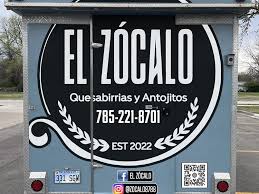 Our Food Truck Got a New Look 👀 🚚 We're so excited to show off our fresh new design—inspired by our beautiful city of Topeka 🌻 Our truck now proudly displays scenes