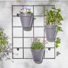 Take a different angle on plant hanging. Vertical Wall Plant Holder Novocom Top