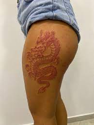 Red Dragon Tattoo In 2021 Dragon Thigh Tattoo Red Ink Tattoos Hip Thigh Tattoos