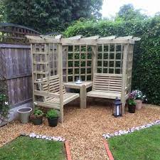 Arbours are freestanding structures that serve as a shelter and can provide privacy, shade and a seating area for use in gardens. 28 Beautiful Corner Garden Ideas And Designs Corner Garden Garden Arbor Garden Seating