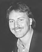 Archbishop Buechlein ordains five men to the priesthood