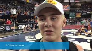 Clark County wrestlers feed off energy of Mat Classic